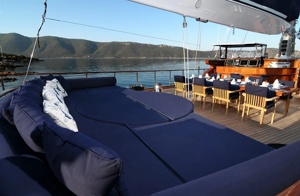 Luxurious cushioned aft deck lounge area on S/Y Clear Eyes 141 feet sailing ketch for relaxation