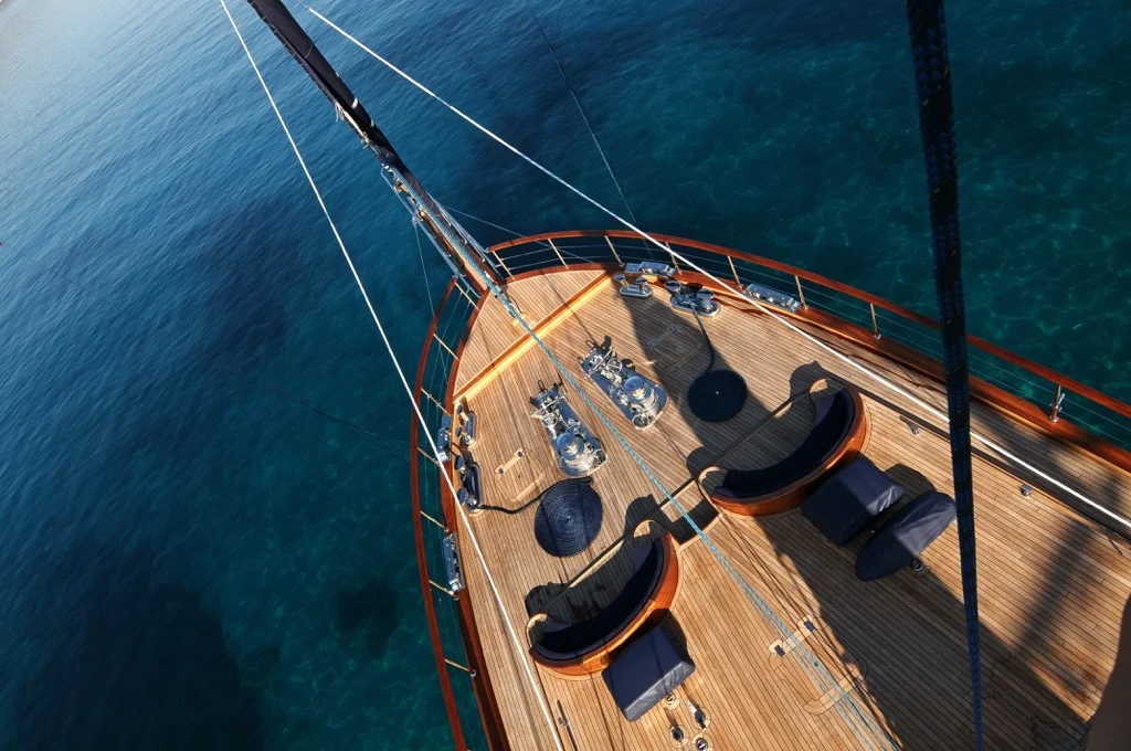 Dramatic view from mast looking down at S/Y Clear Eyes bow section during Mediterranean sailing charter
