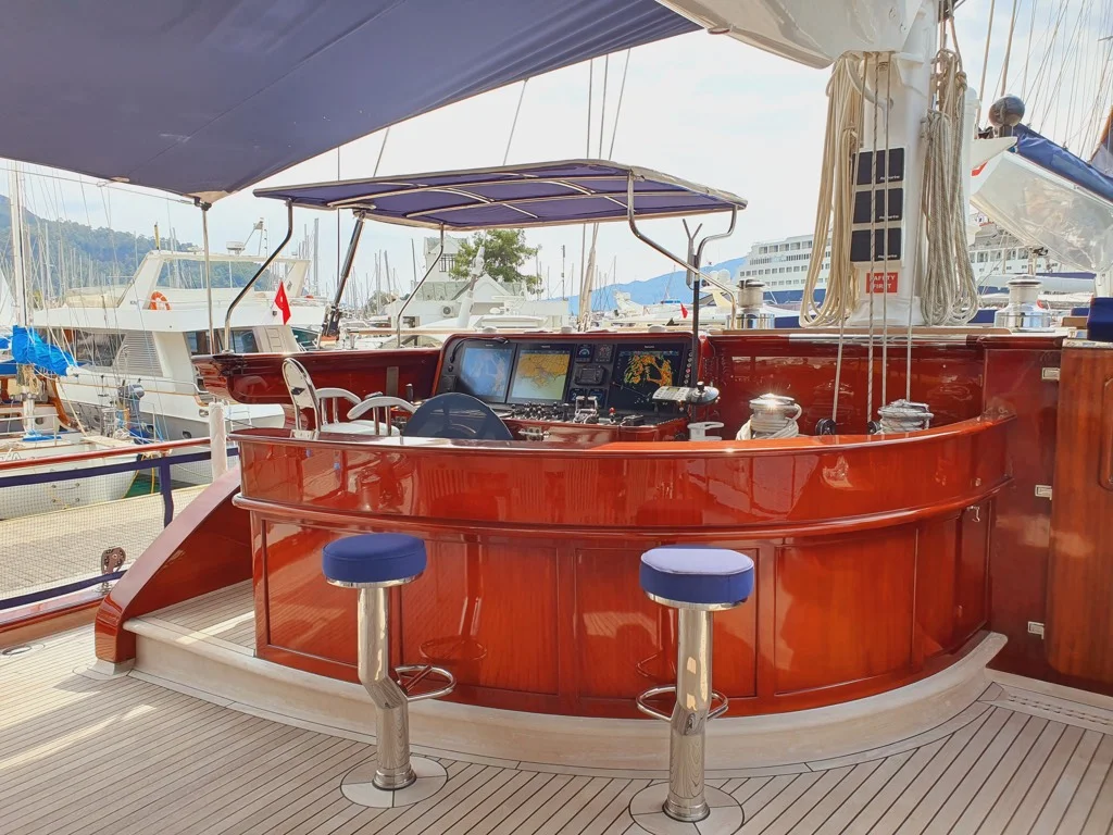 Fully stocked cockpit bar on S/Y Clear Eyes luxury yacht serving premium spirits and fine wines