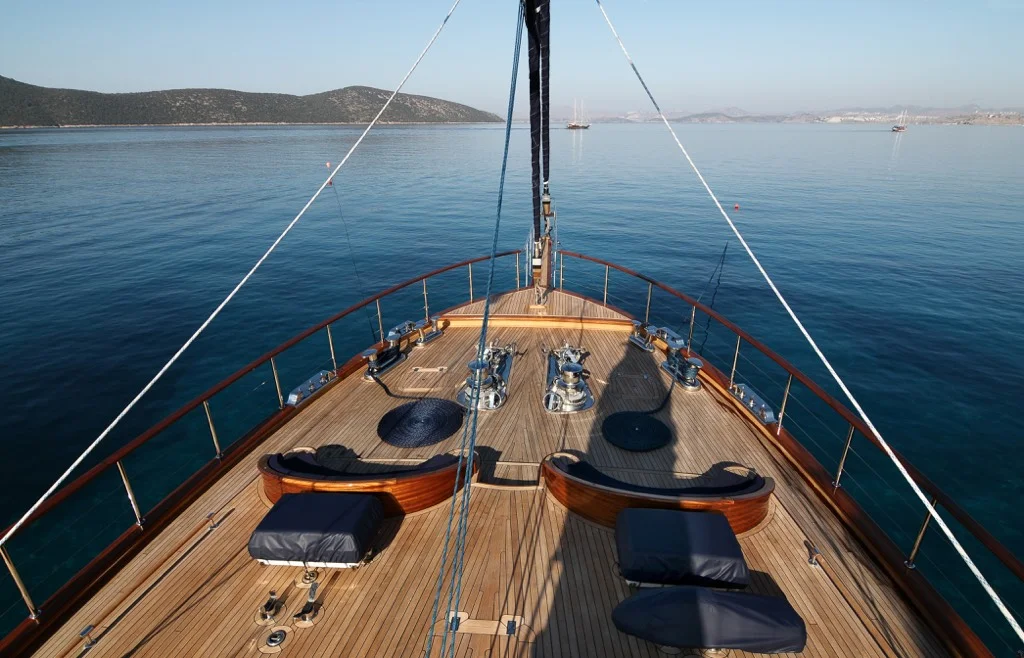 Luxurious forward deck lounge area on S/Y Clear Eyes yacht charter perfect for relaxation and sunbathing