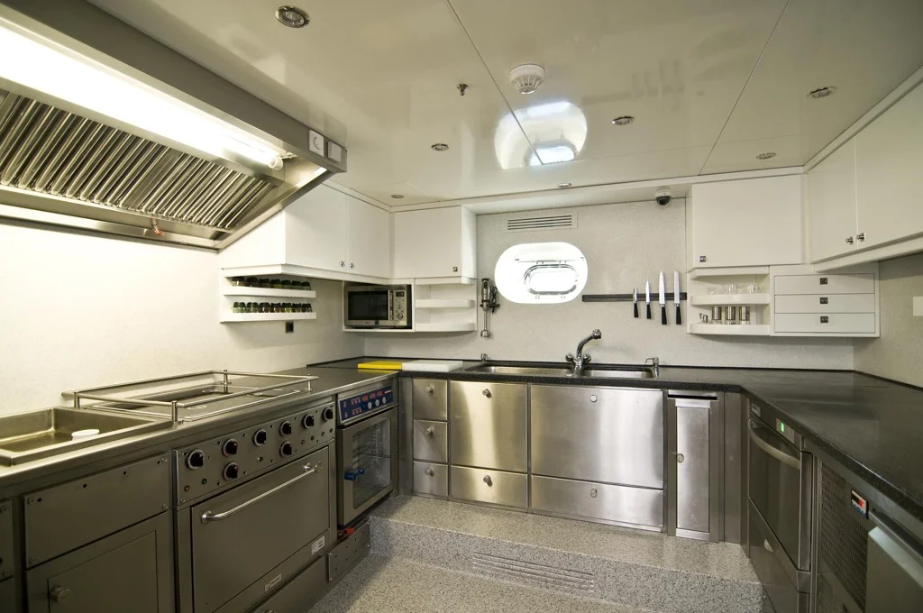 Professional fully-equipped galley kitchen on S/Y Clear Eyes where chef prepares gourmet Mediterranean cuisine