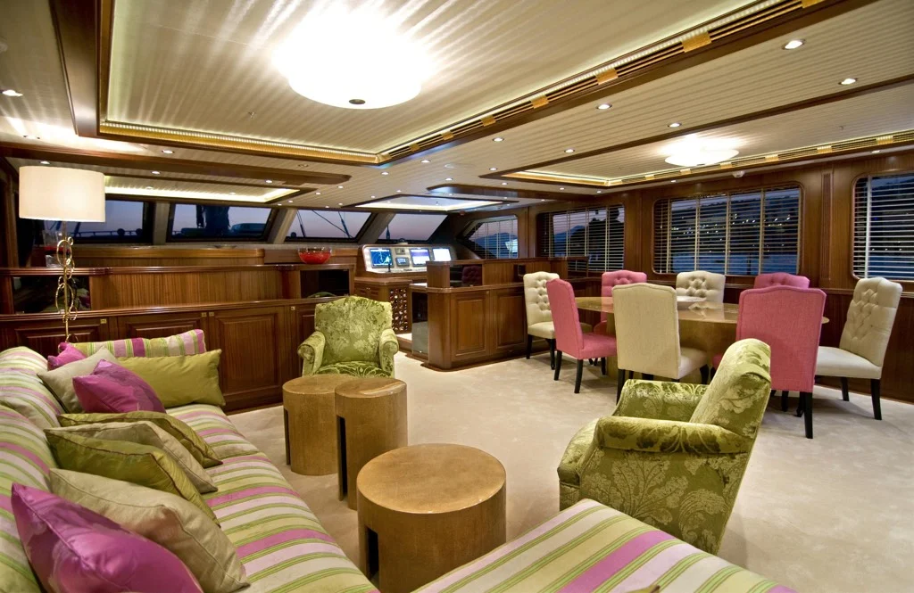 Elegantly appointed main salon interior of S/Y Clear Eyes luxury yacht featuring rich wood finishes and plush seating