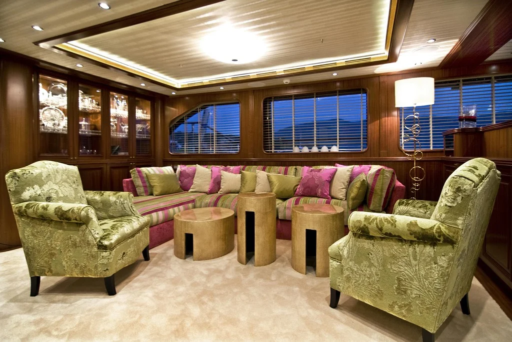 Sophisticated salon lounge with comfortable seating inside S/Y Clear Eyes 141 feet luxury charter yacht