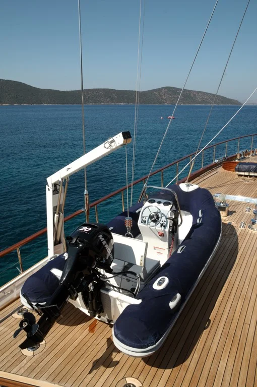 Tender boat securely stored on S/Y Clear Eyes aft deck ready for Mediterranean exploration